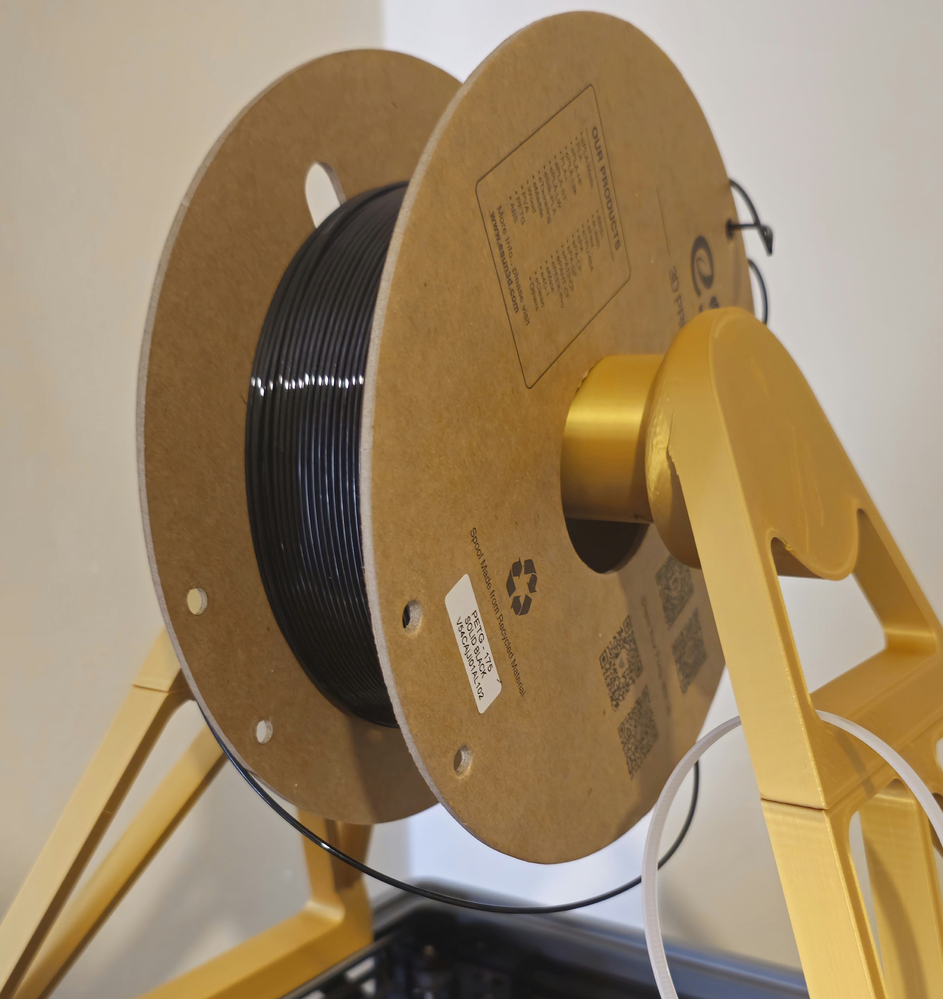 Black PETG filament spool