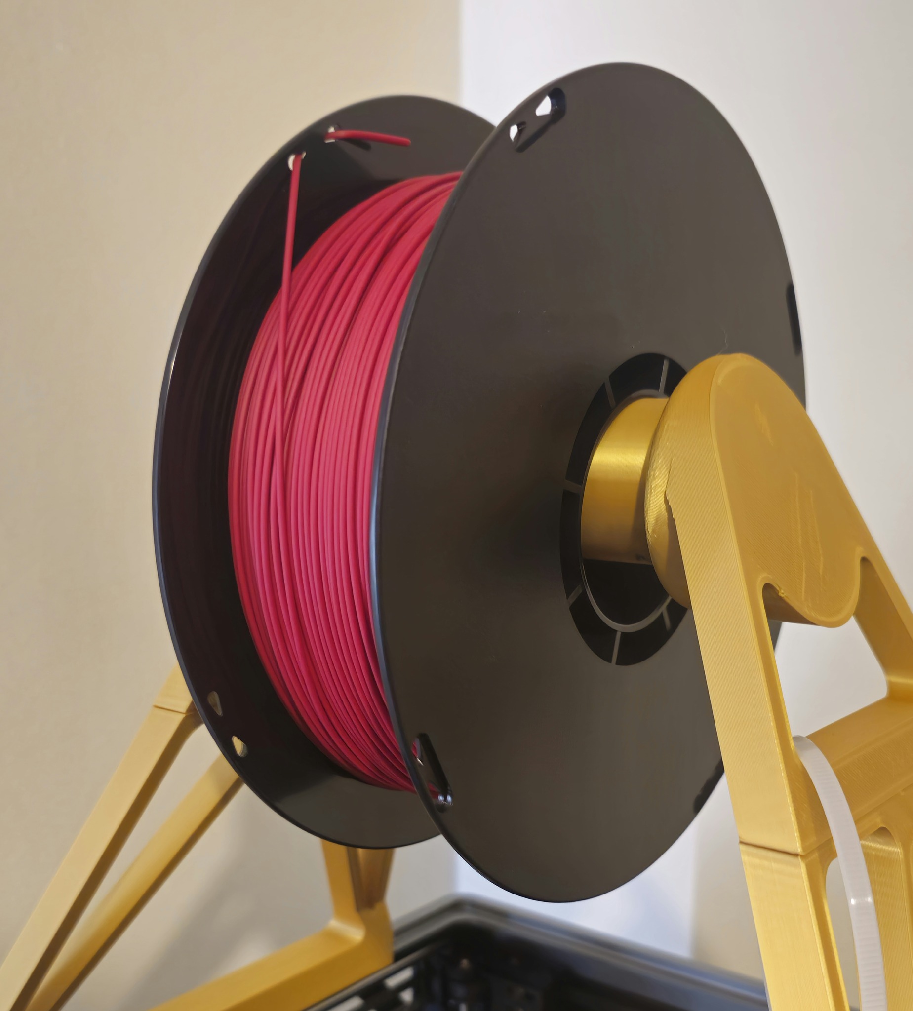 Cherry Red PLA filament spool