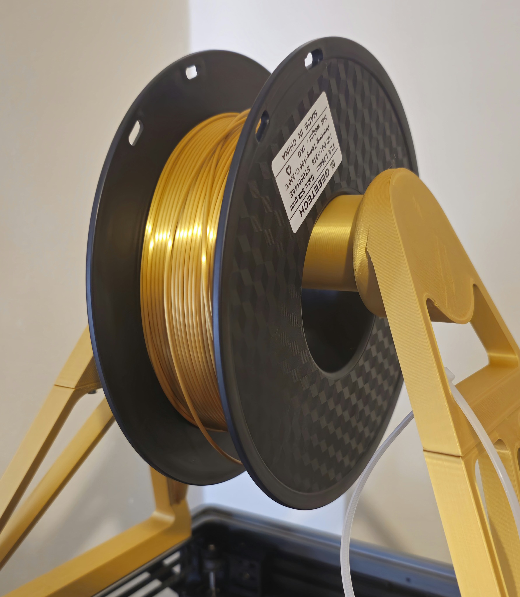 Gold Silk PLA filament spool