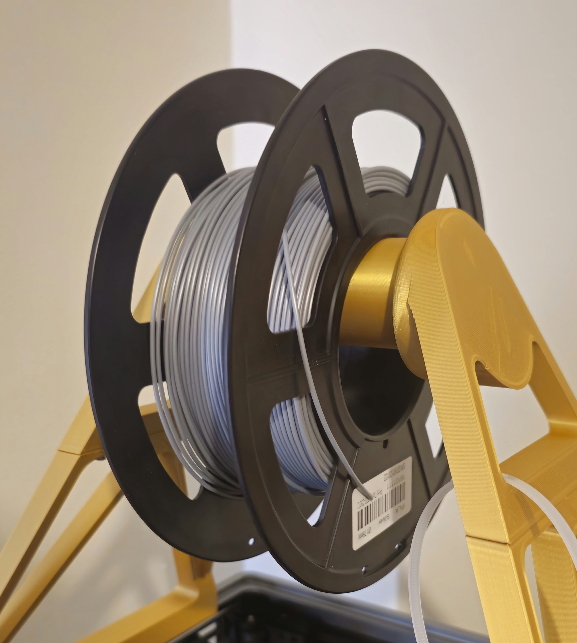 Silver PLA filament spool